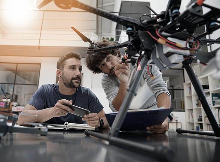 Engineers working on a drone