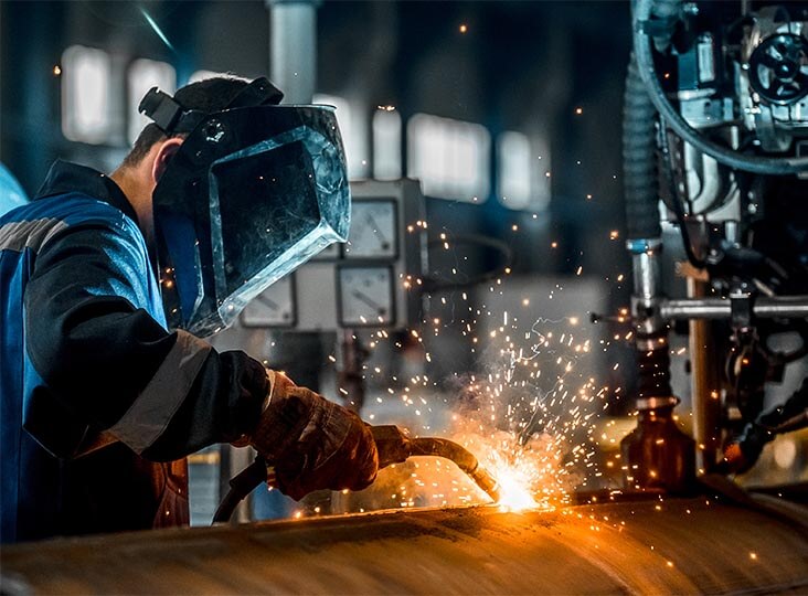 man welding